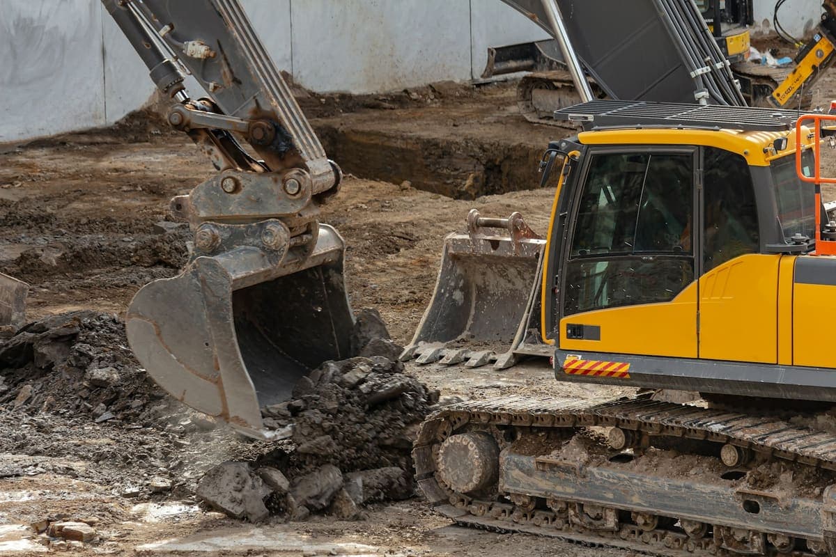 Excavators preparing a building site